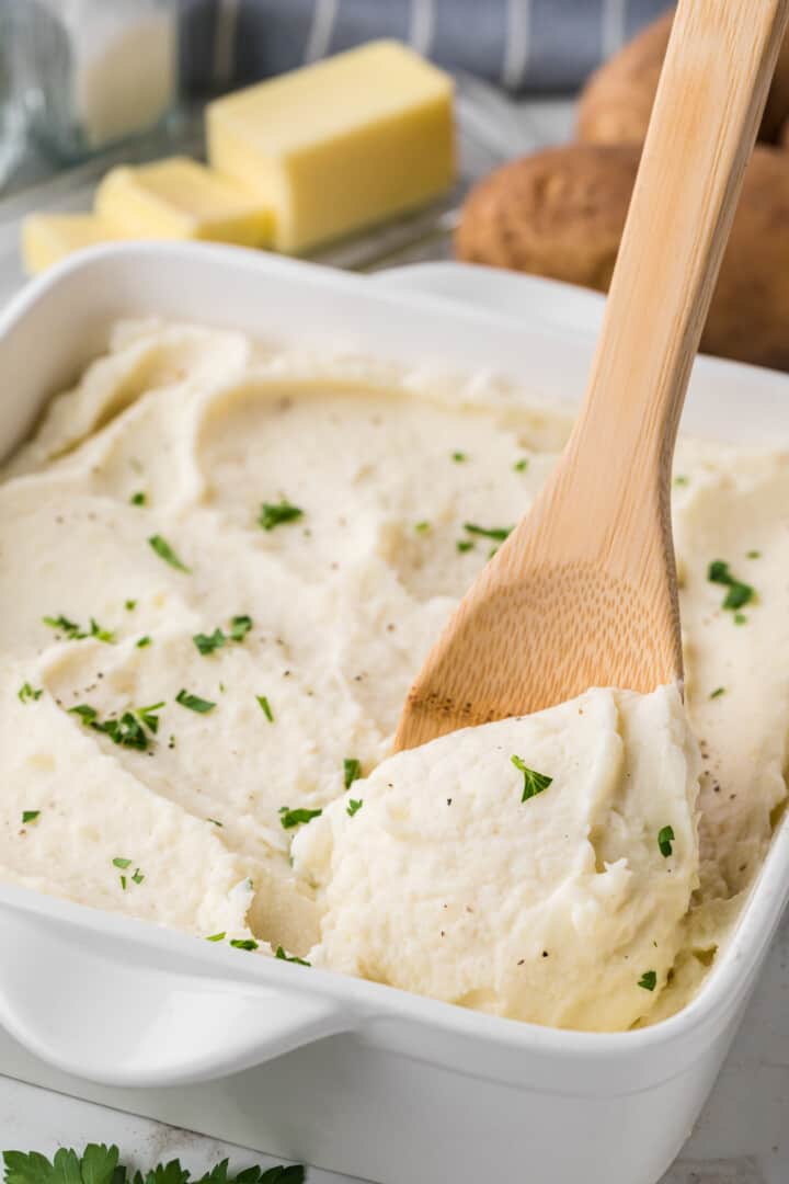 mashed potatoes in large white casserole dish.