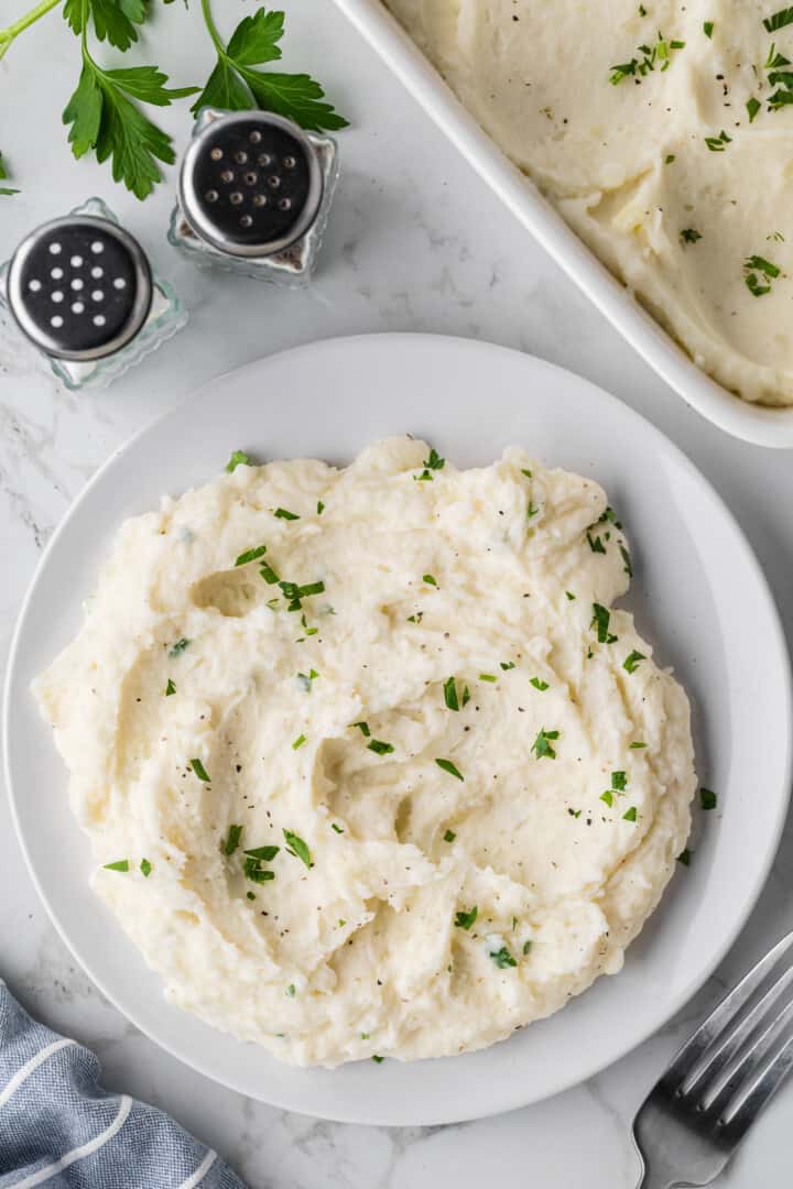 top-down view of the mashed potatoes on a white plate.