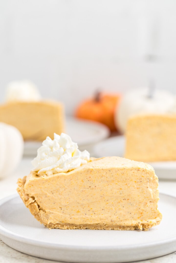 closeup of a slice of pie on white plate.