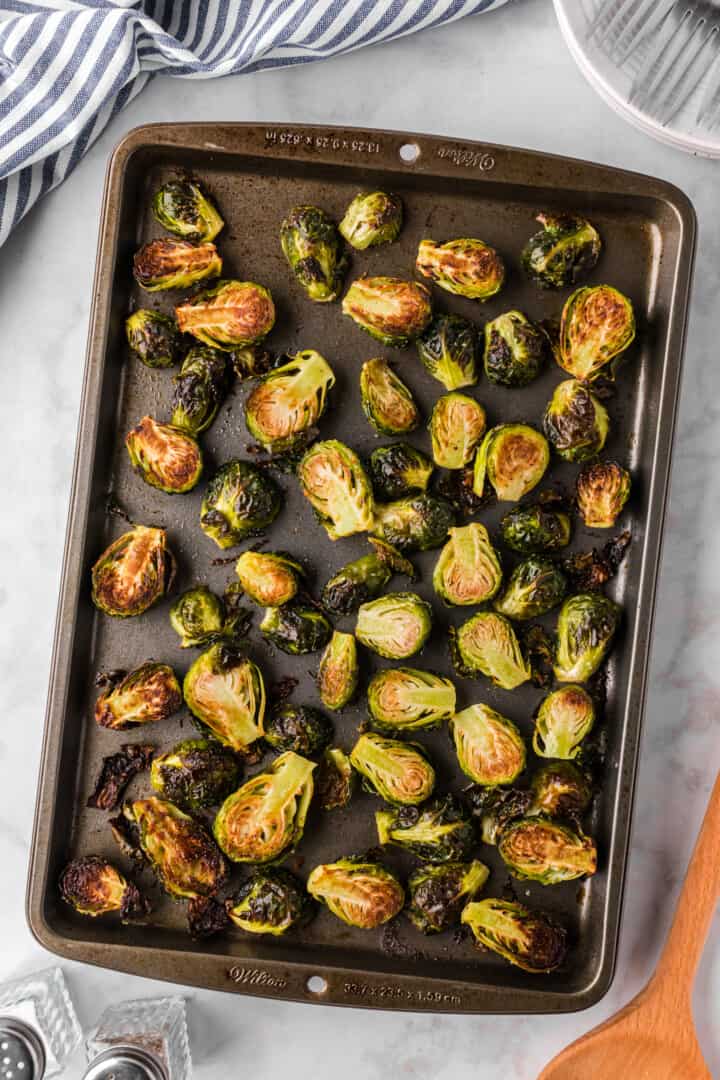 Roasted Brussel Sprouts on baking sheet.