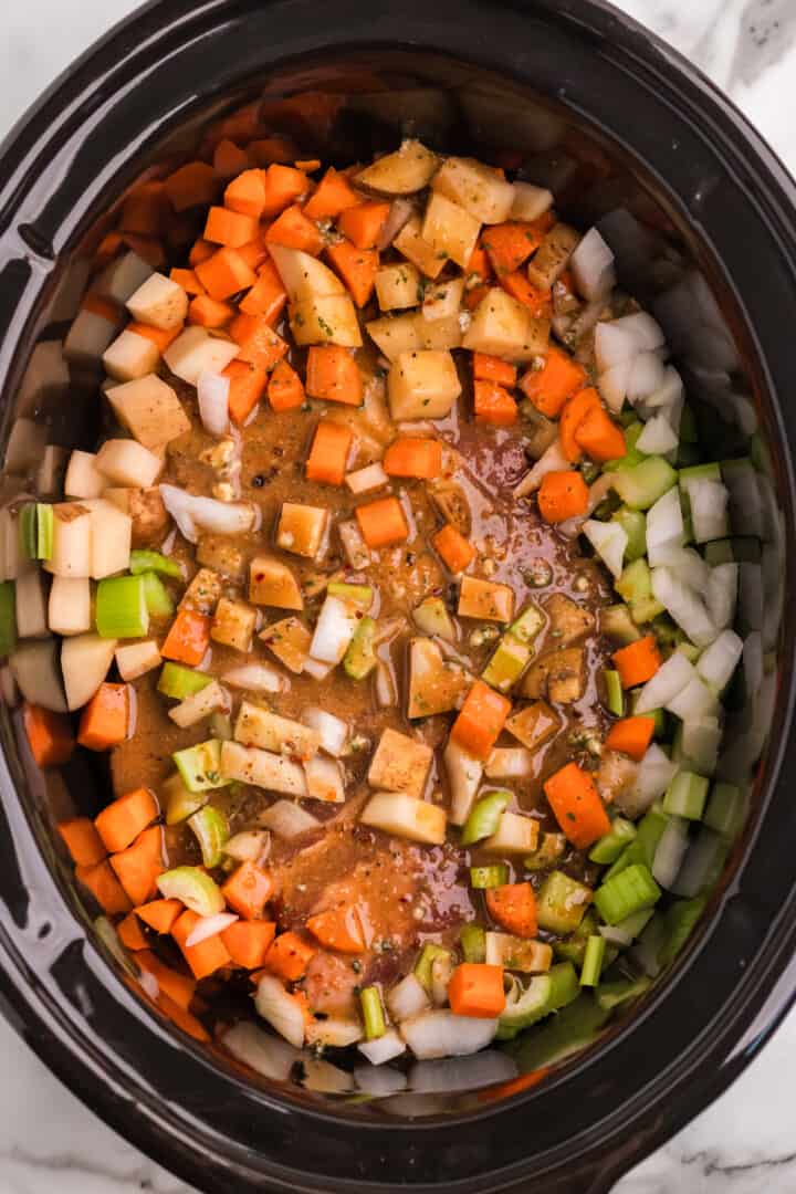 adding the seasoning to make the broth for the cook.