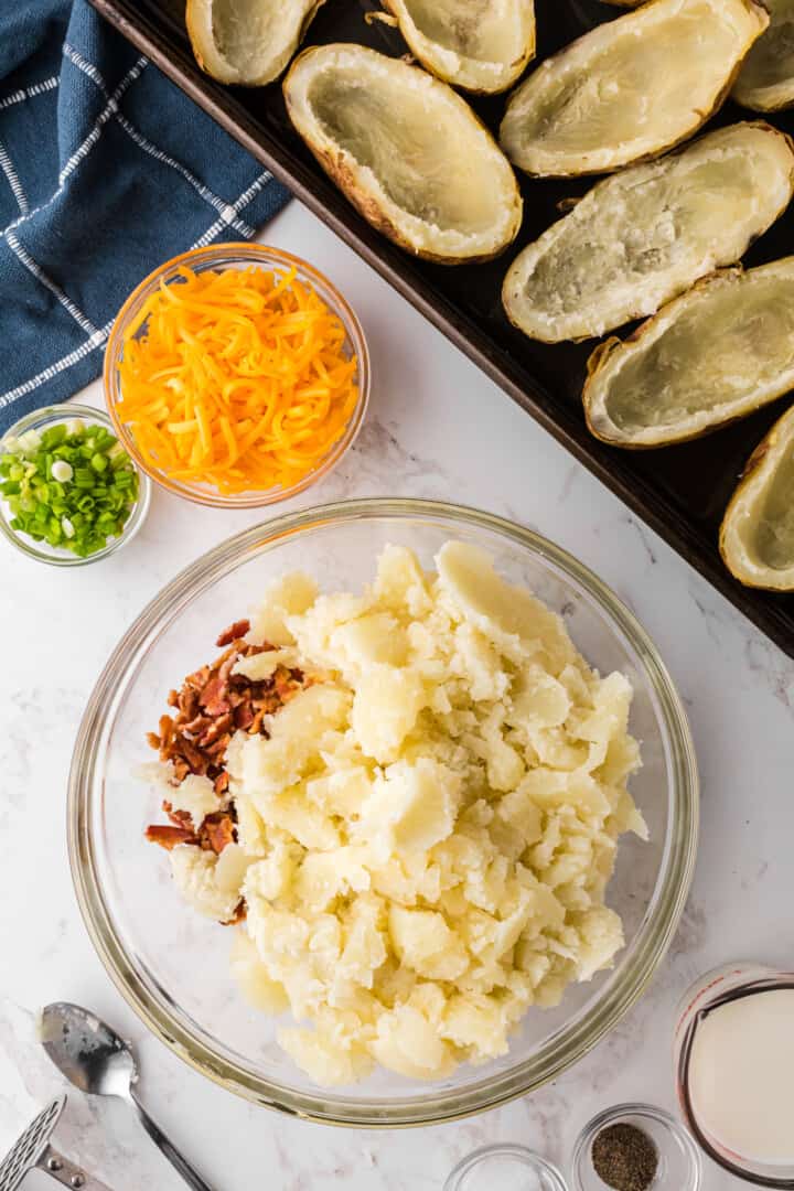 adding potatoes to the filling.