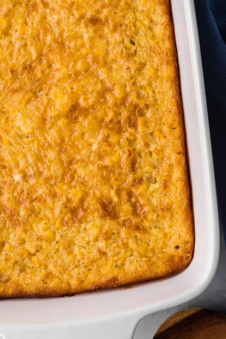 closeup of corn pudding in casserole dish.