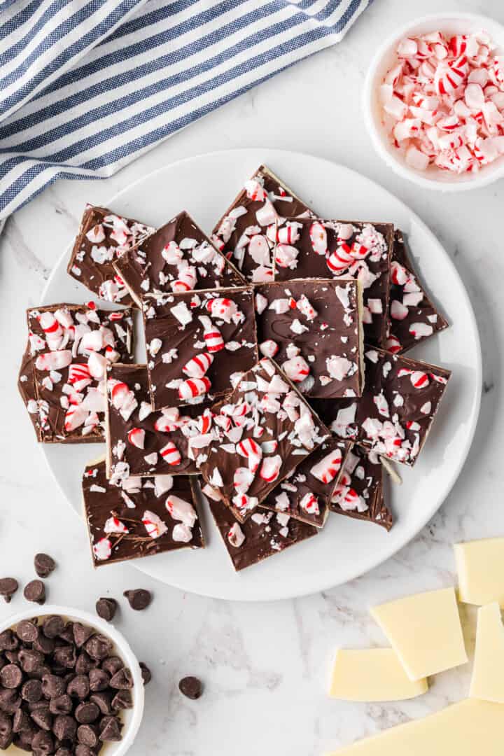 top-down view of peppermint bark on white plate.