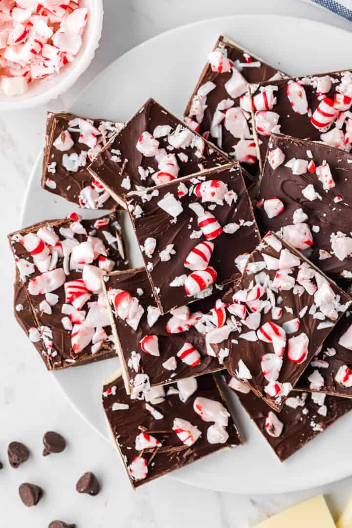 Peppermint Bark stacked on a white serving plate.