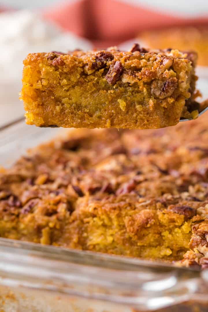 slice of pumpkin crunch cake on spatula.