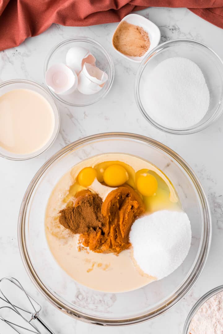 mixing together the cake ingredients.