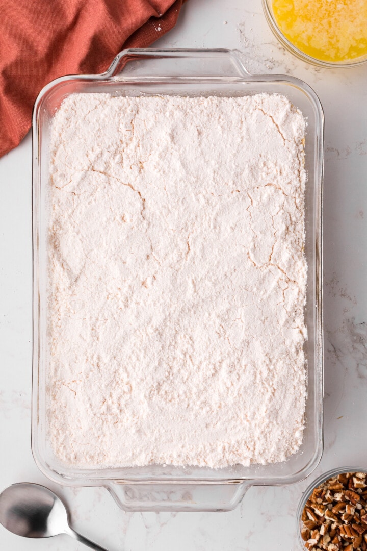 the dry cake ingredients spread over the cake batter.
