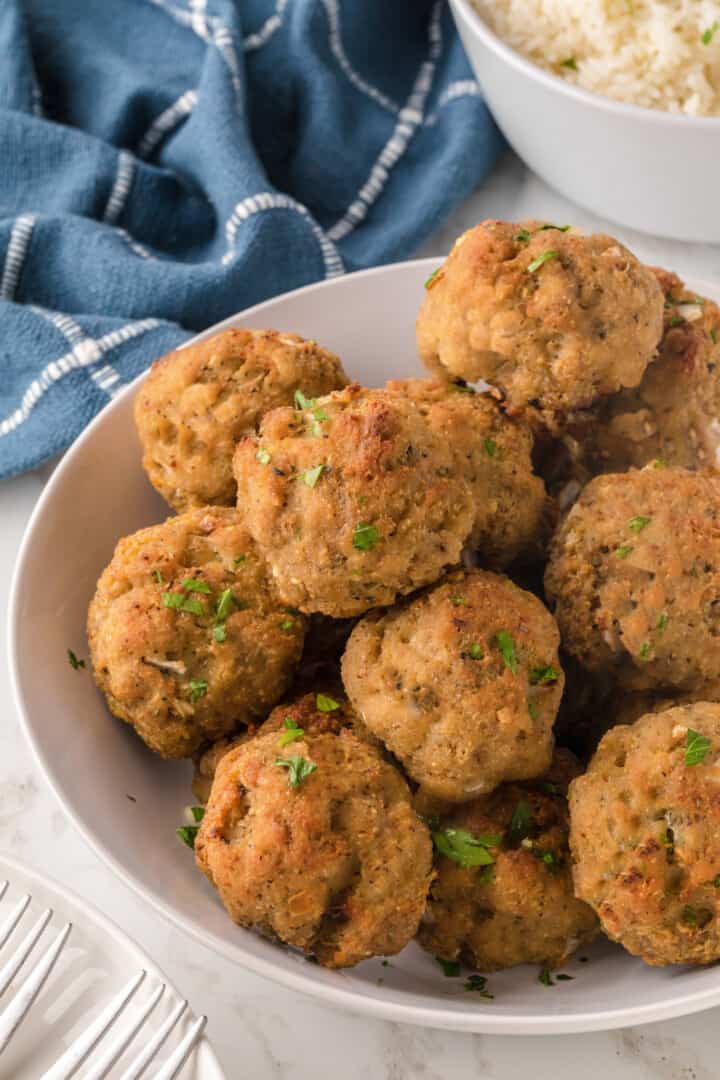 Turkey Meatballs on white serving board.