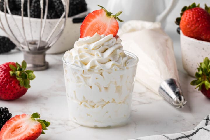 closeup of a cup of homemade whipped cream.