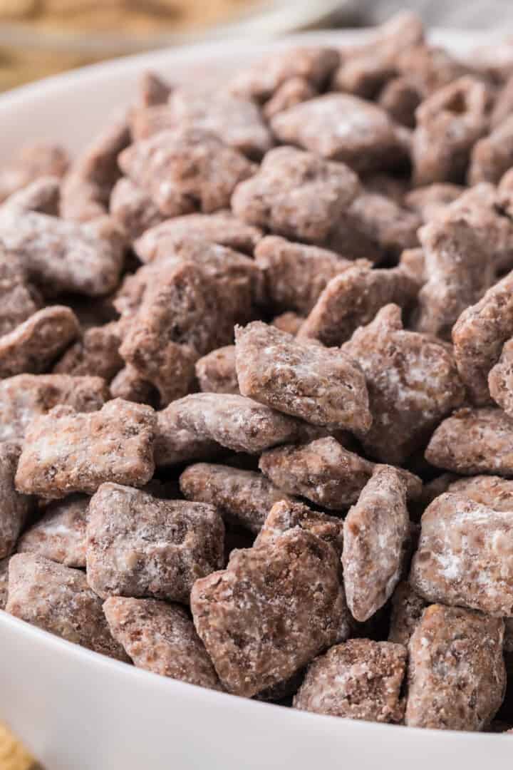 closeup of muddy buddies in white bowl.