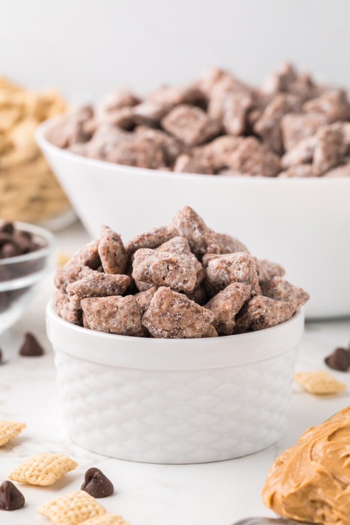 closeup of the Muddy Buddies served in a white bowl.