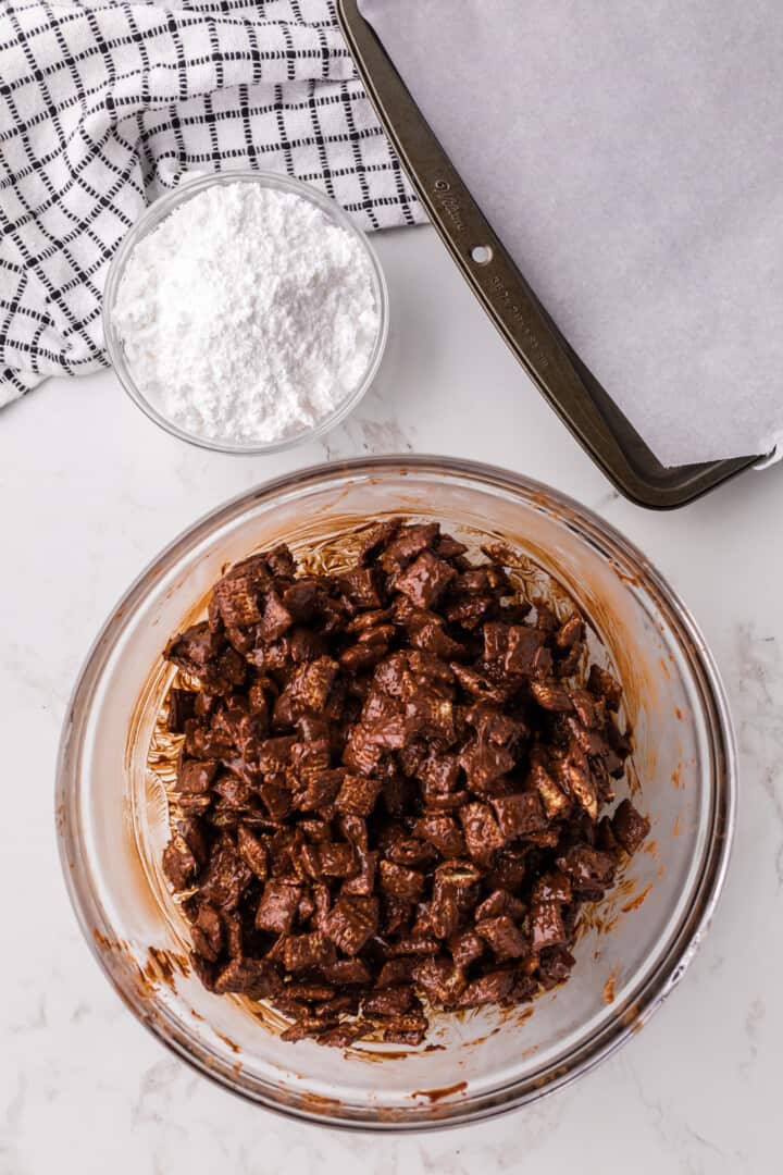 Chex cereal mixed in with melted chocolate.