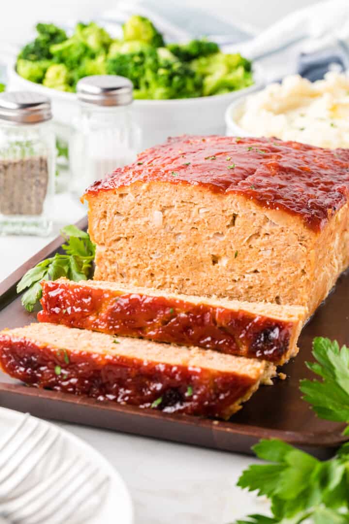 Chicken Meatloaf sliced on a baking sheet.