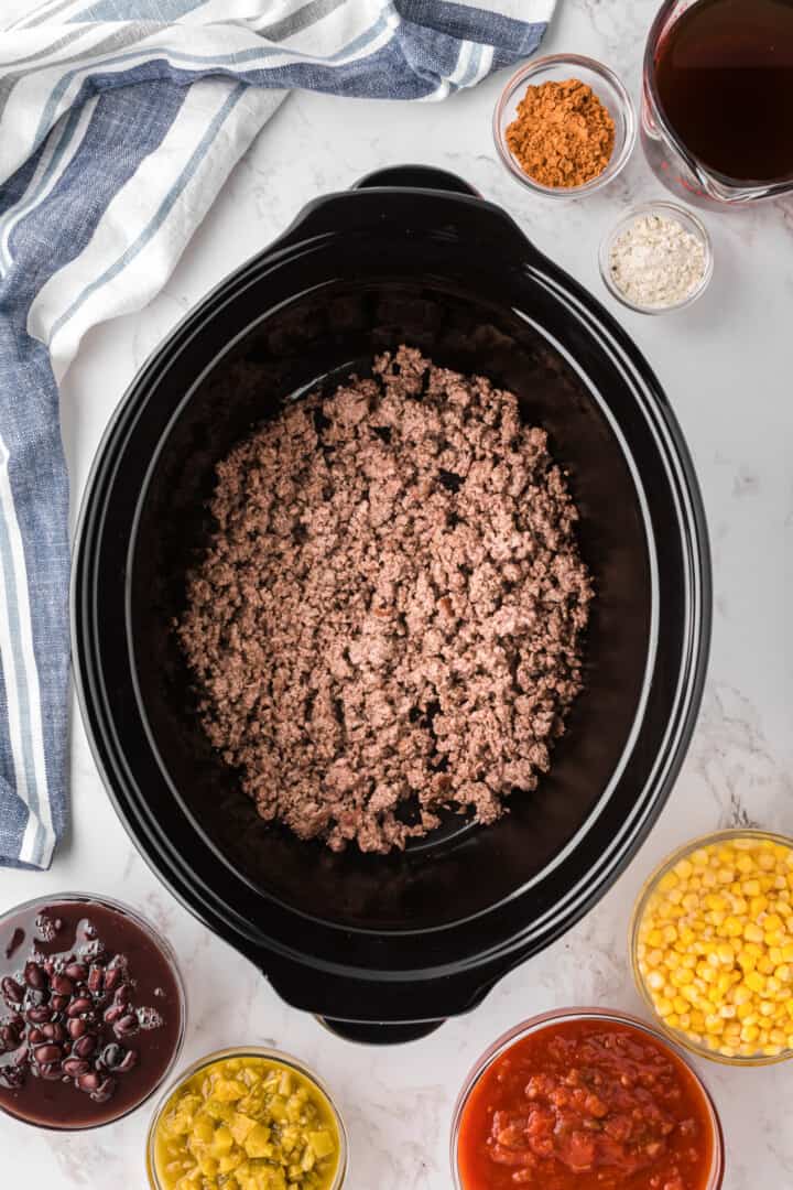 cooked ground beef in the slow cooker.