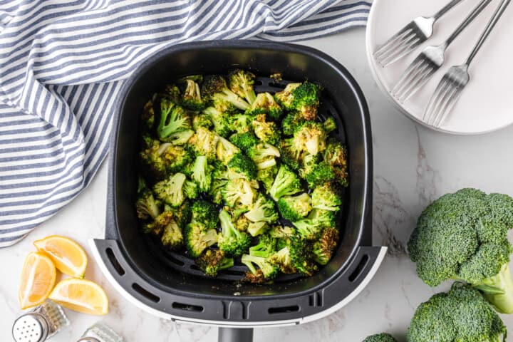 air fryer broccoli in the basket.