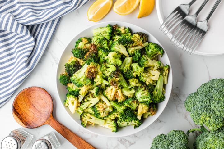 Air Fryer Broccoli in white serving bowl.