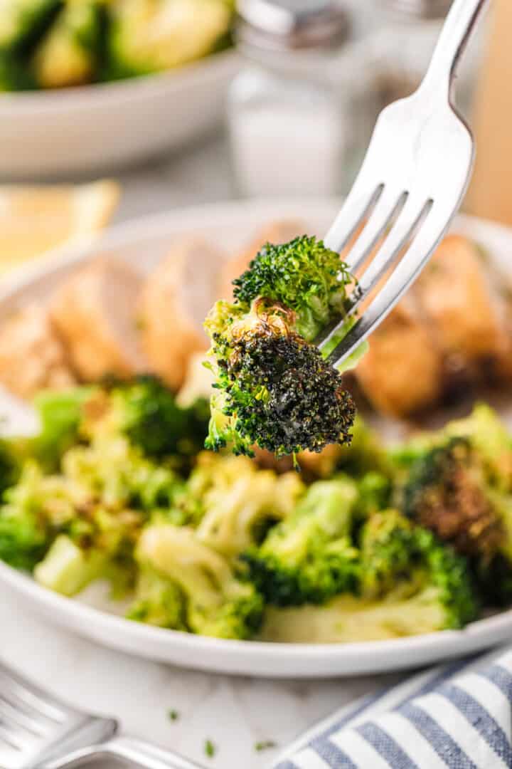 closeup of air fryer broccoli on a fork.