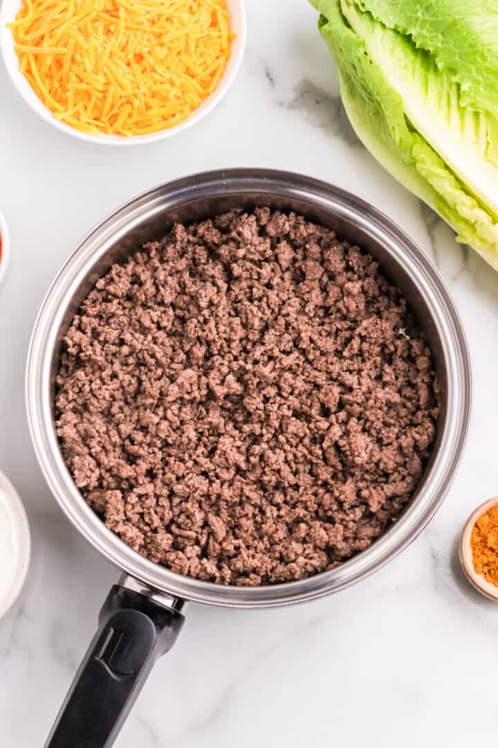 ground beef cooked in a pan.