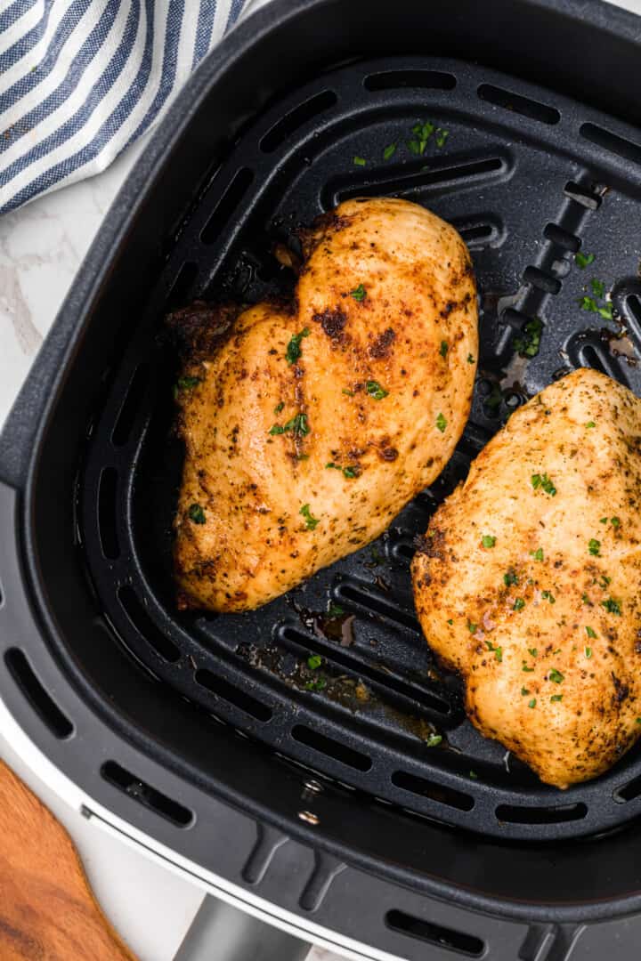 chicken breasts cooked in an air fryer.