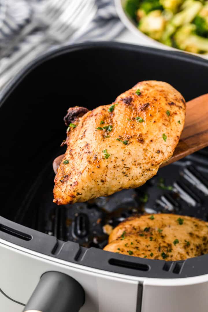 serving the chicken breasts out of the air fryer.