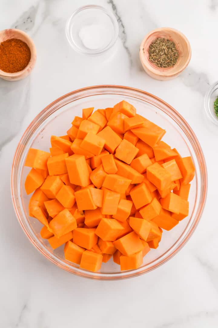 diced sweet potatoes in glass bowl.