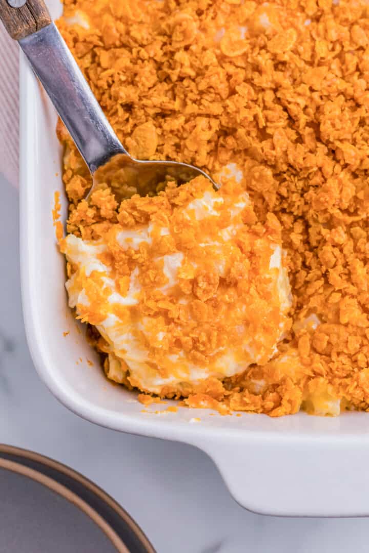 serving the funeral potatoes out of the casserole dish.