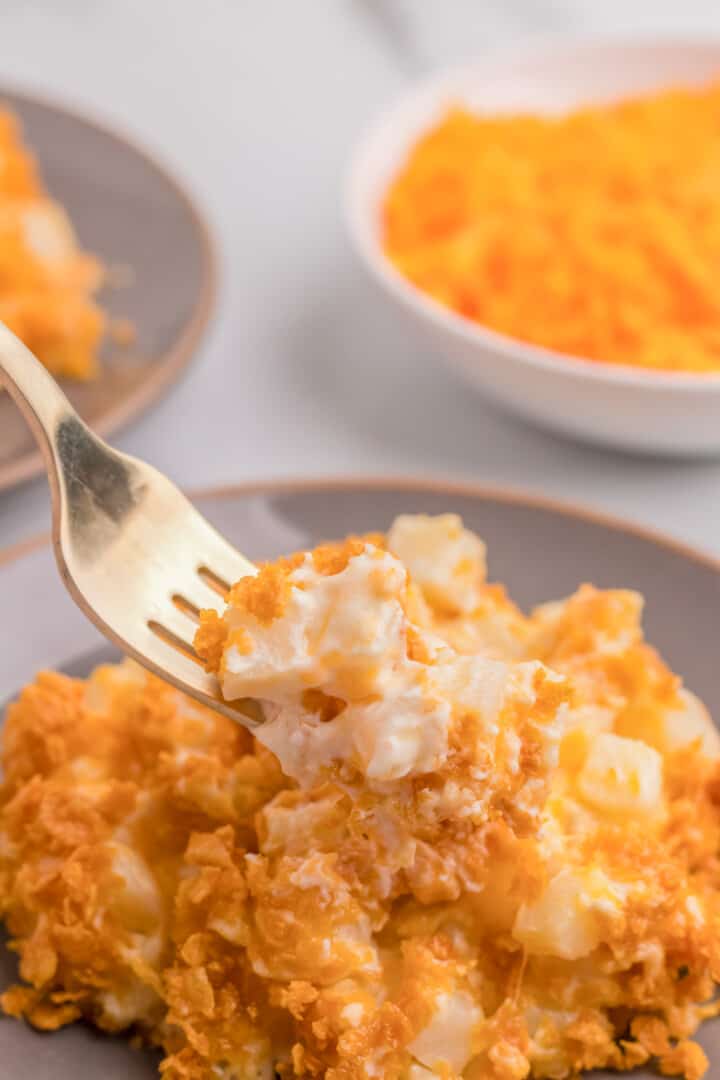 eating the funeral potatoes with a fork.