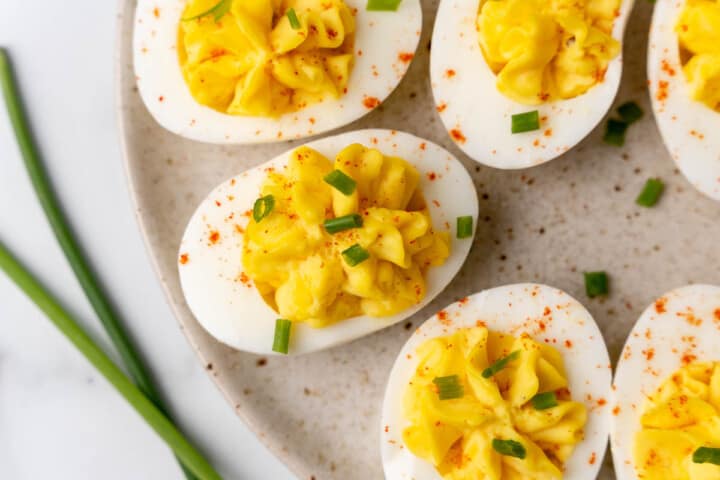 closeup of the deviled eggs on a serving tray.