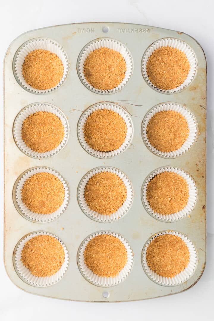 graham crackers pressed into muffin liners to make crust.