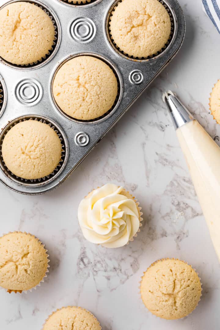 cupcakes in a tin with icing.