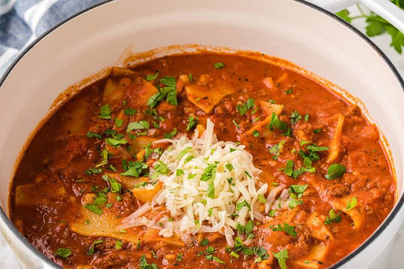 Lasagna Soup in the pot topped with mozzarella cheese.