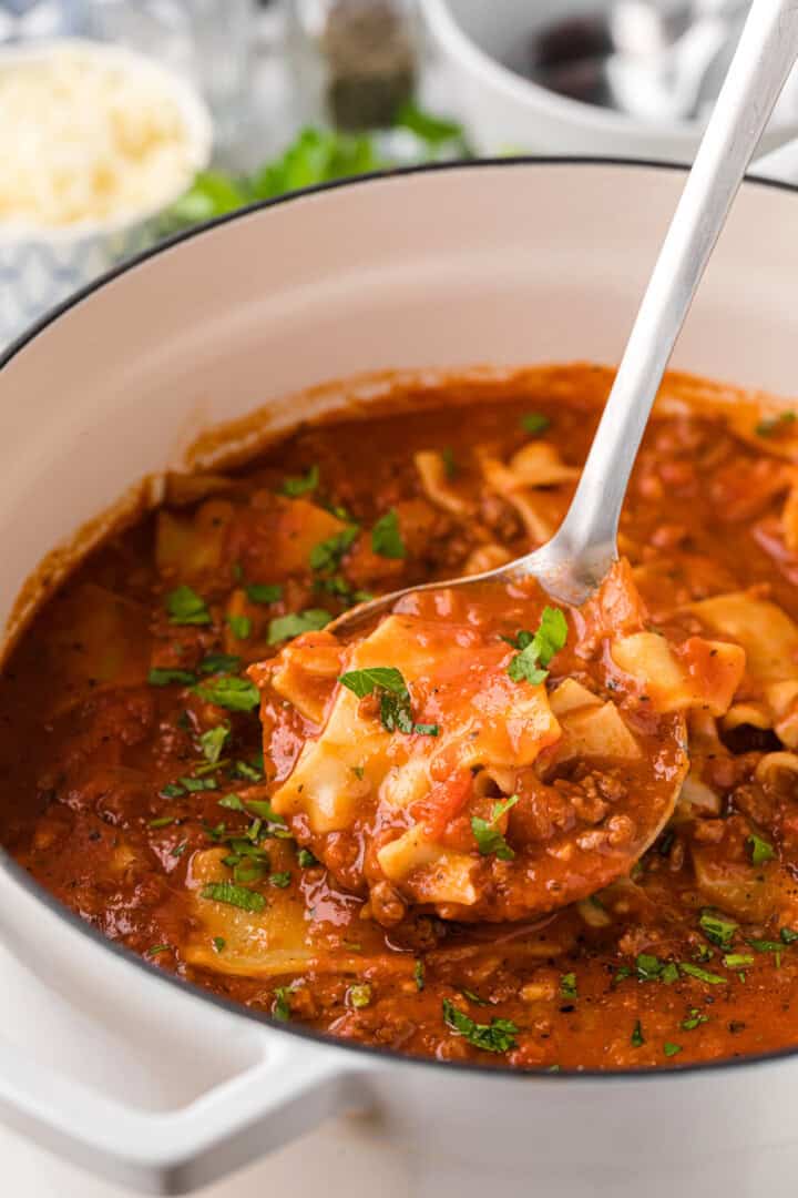 Lasagna Soup served out of the pot with ladle.