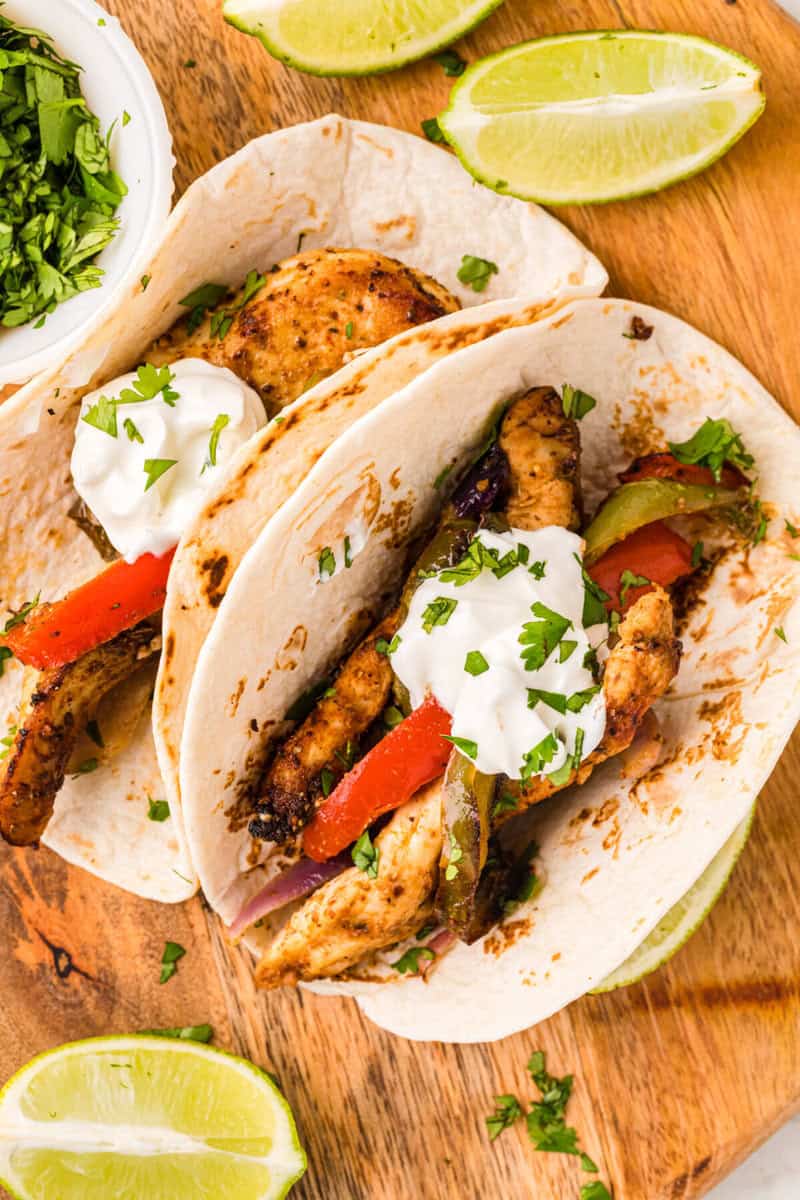 air fryer chicken fajitas served on flour tortillas.