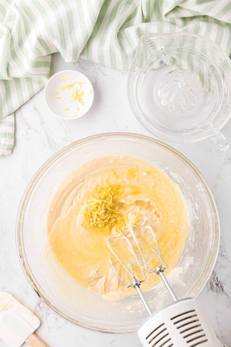 adding the lemon juice and lemon zest to the wet ingredients.