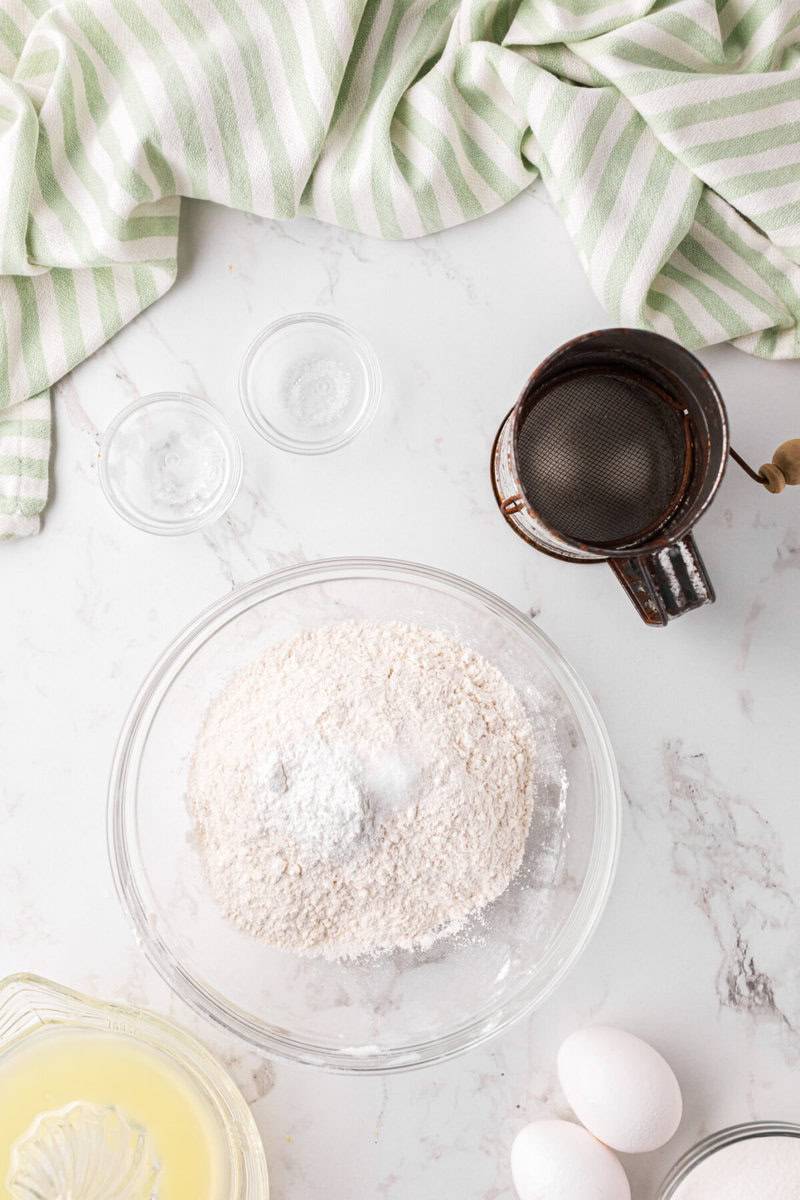 sifting the flour and dry ingredients for the cupcakes.