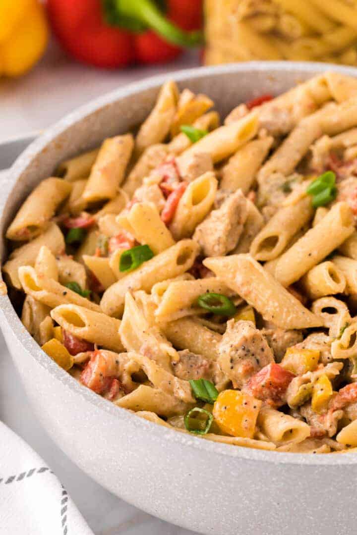 closeup of the Chicken Fajita Pasta being served in a white bowl.