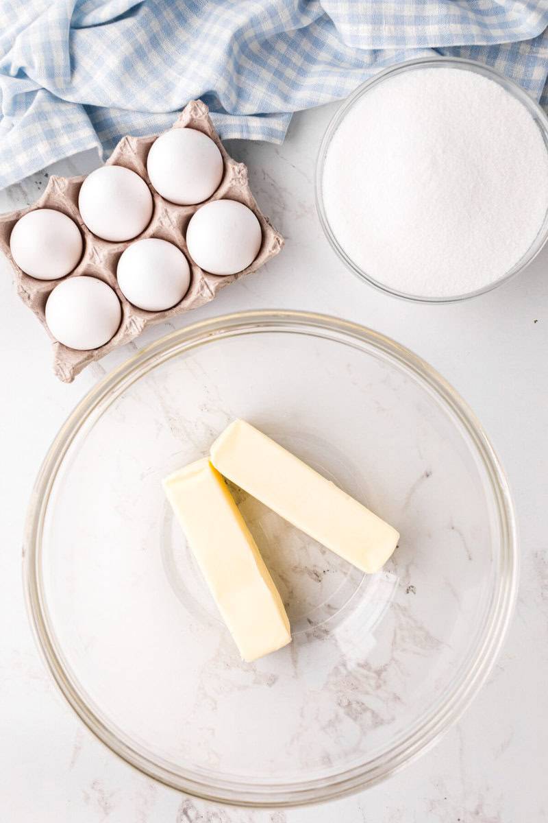 butter for the brownies in large glass bowl.