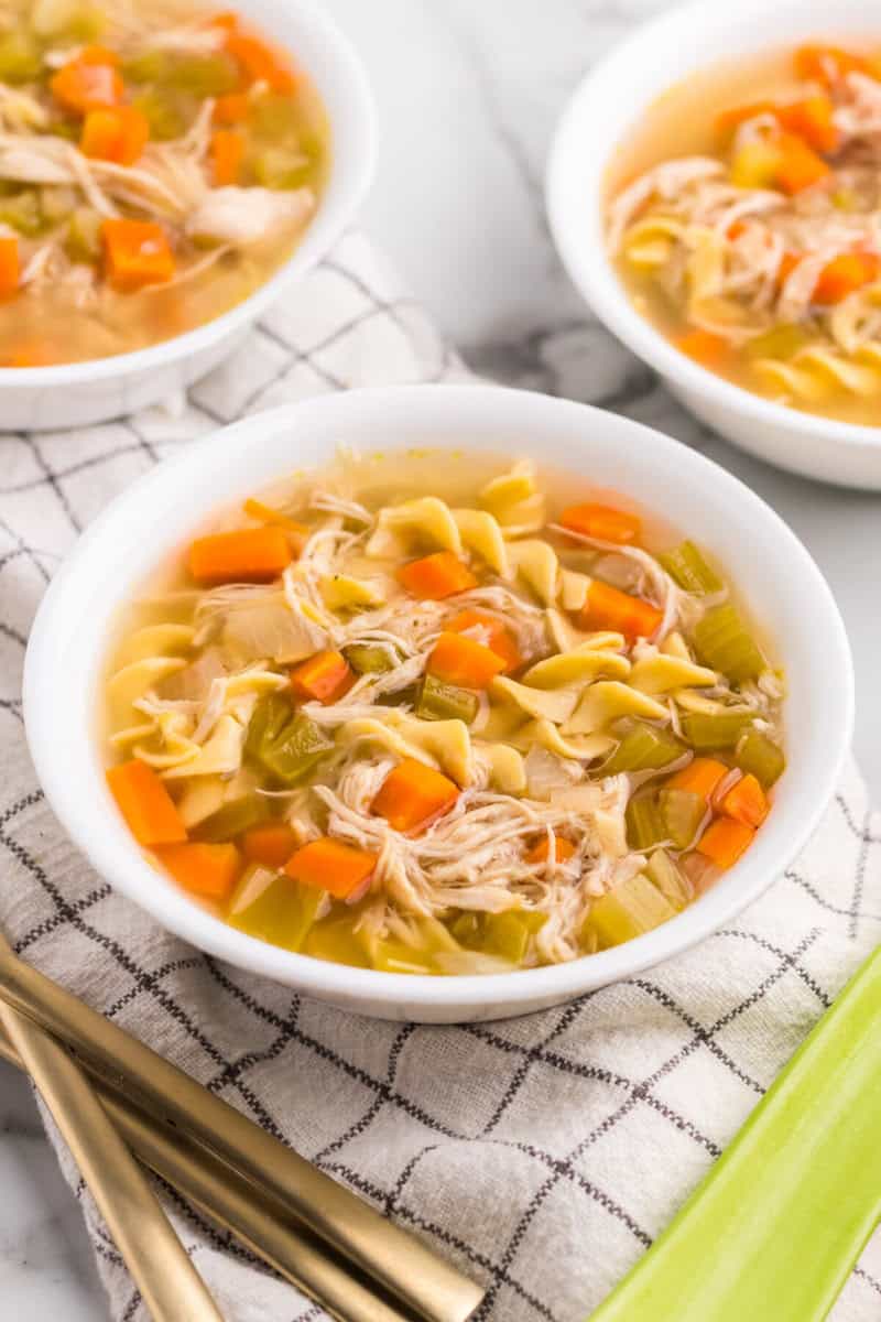 three bowls of the slow cooker chicken soup.