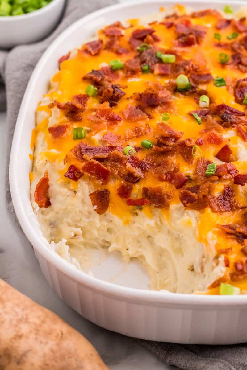 twice baked mashed potatoes served out of the baking dish.