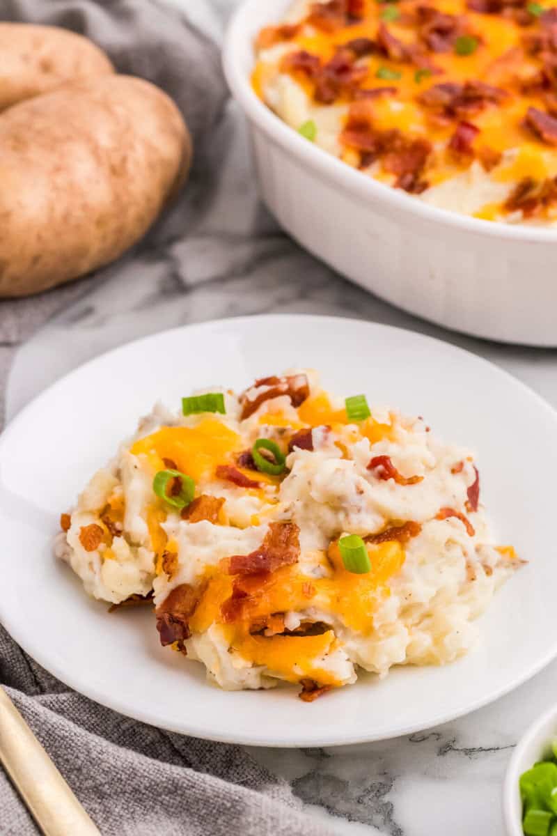 twice baked mashed potatoes served on a white plate.