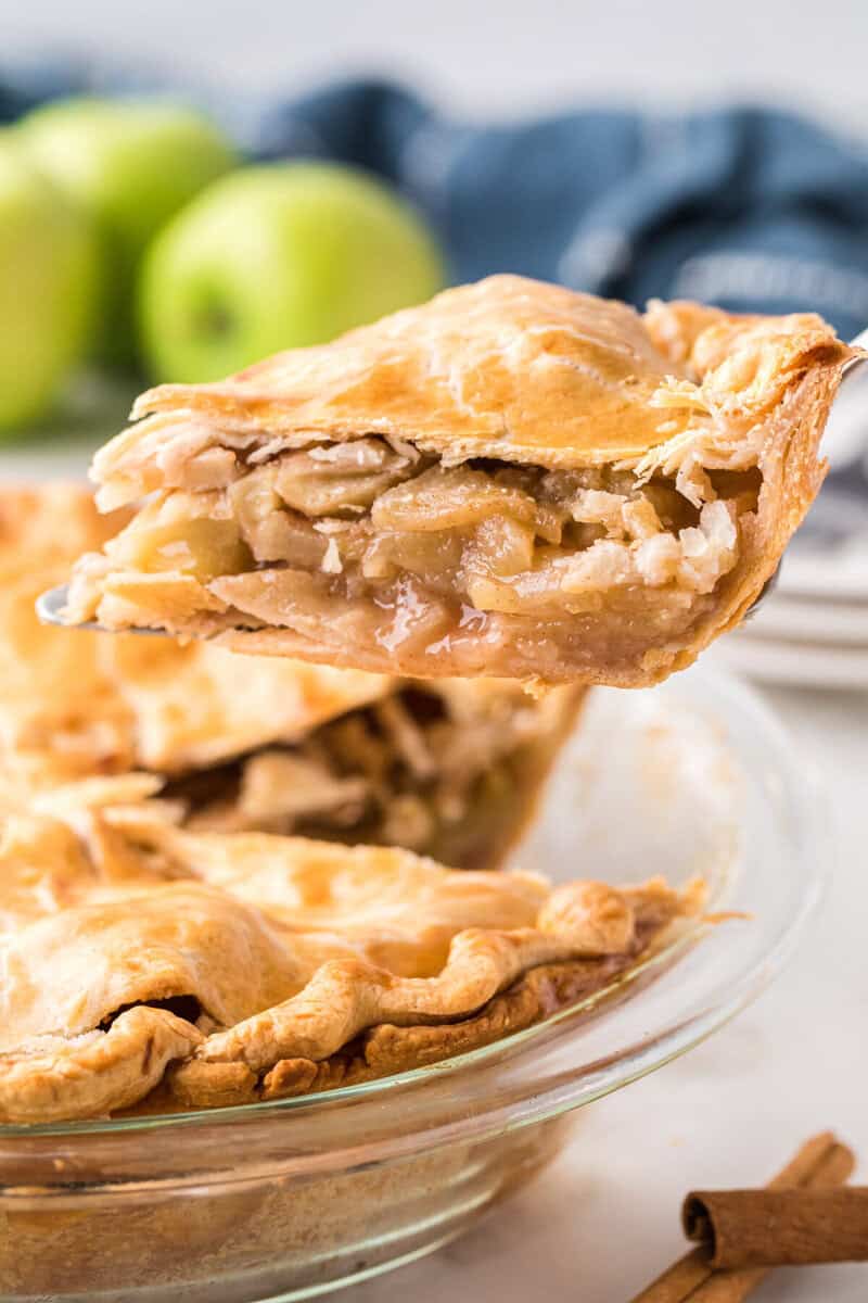 slice of the apple pie being served.