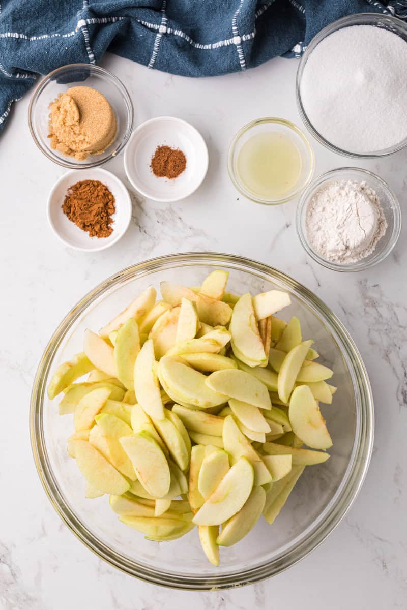 preparing the apples for the pie.
