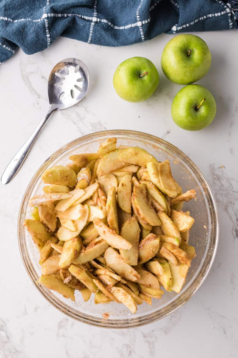 apples mixed with the sugar and seasonings.