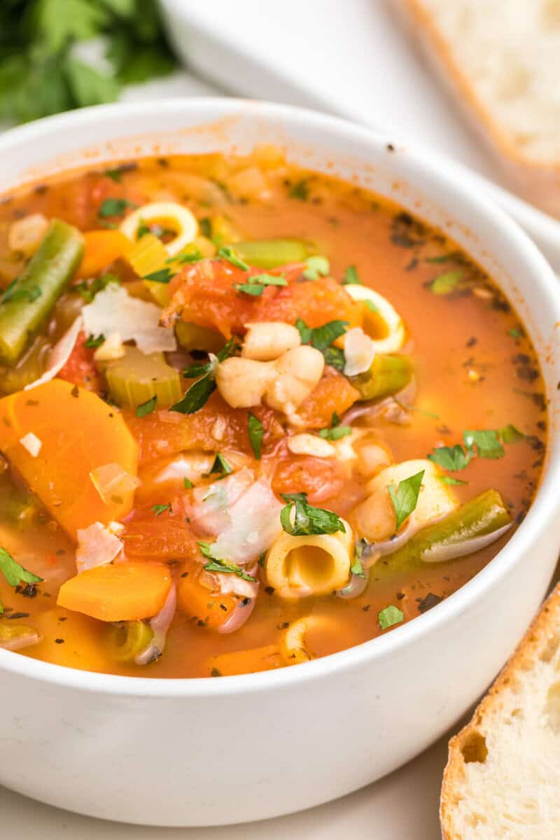 closeup of the minestrone in the white bowl.