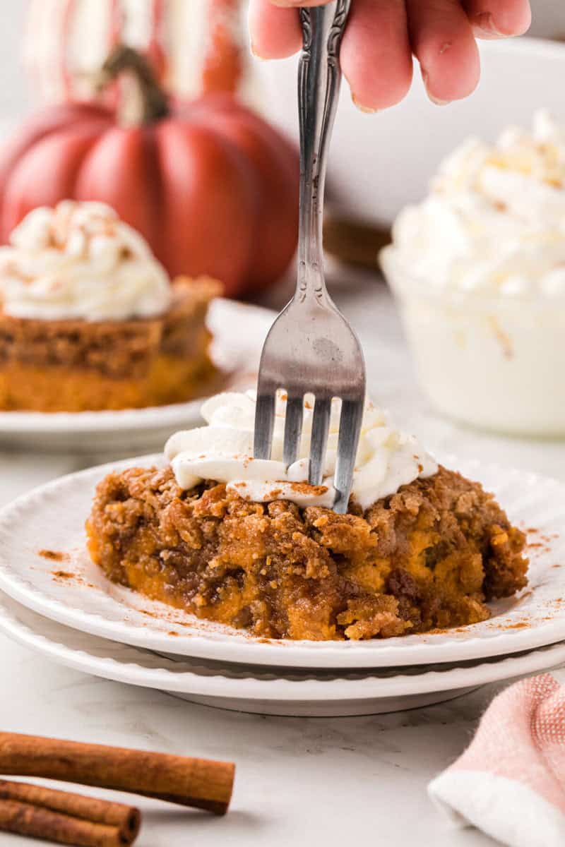 using a fork to eat the cake.