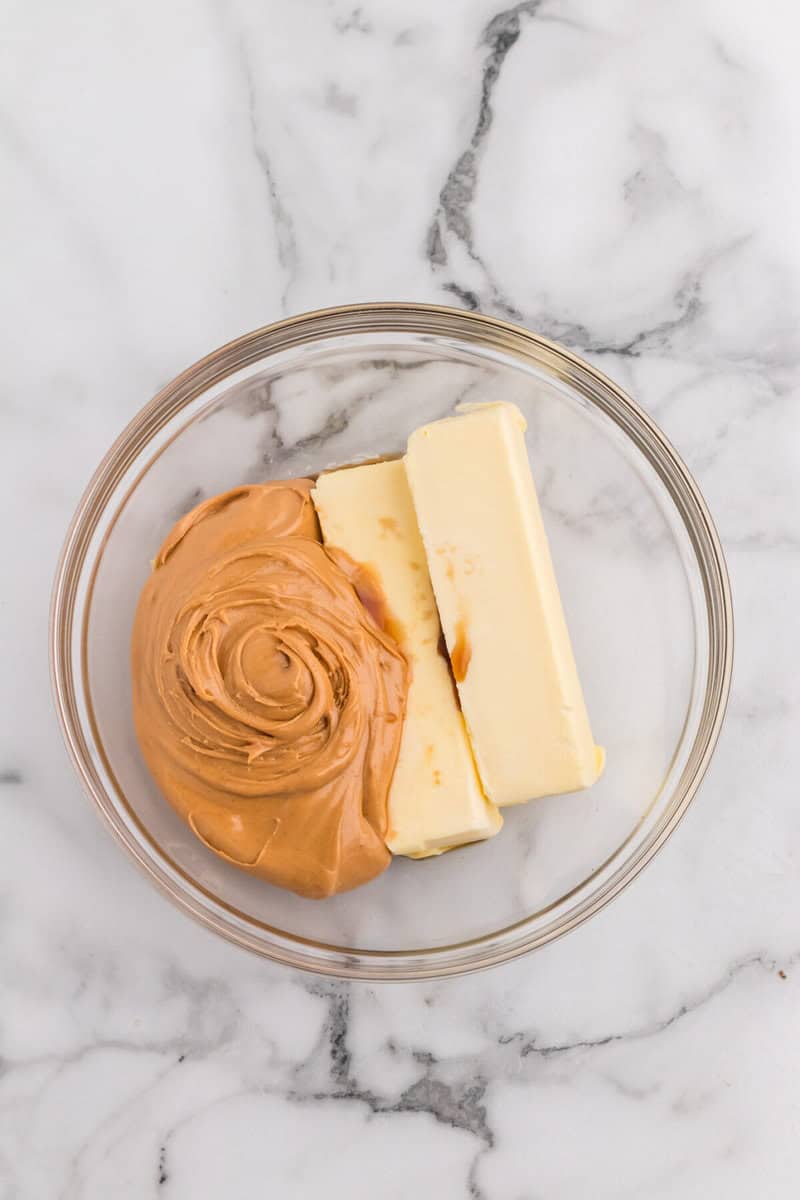 melting the peanut butter and butter in a glass bowl.