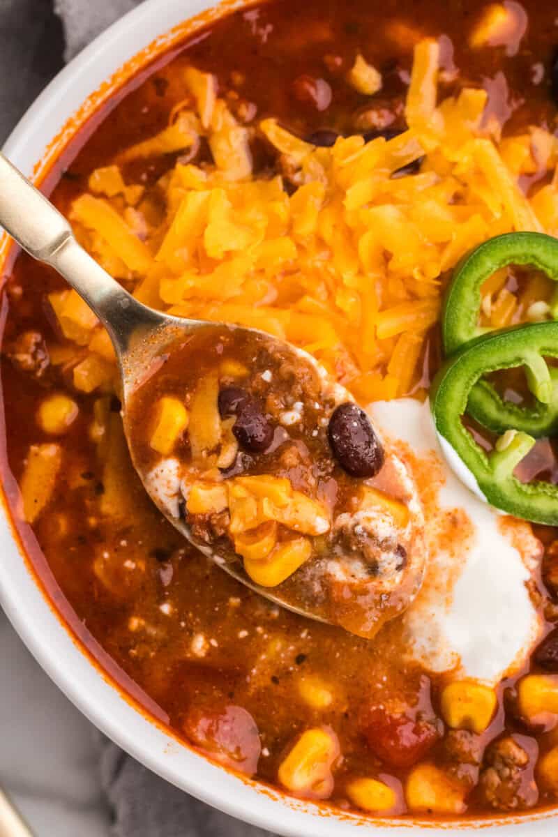 closeup of taking a spoonful of the soup.