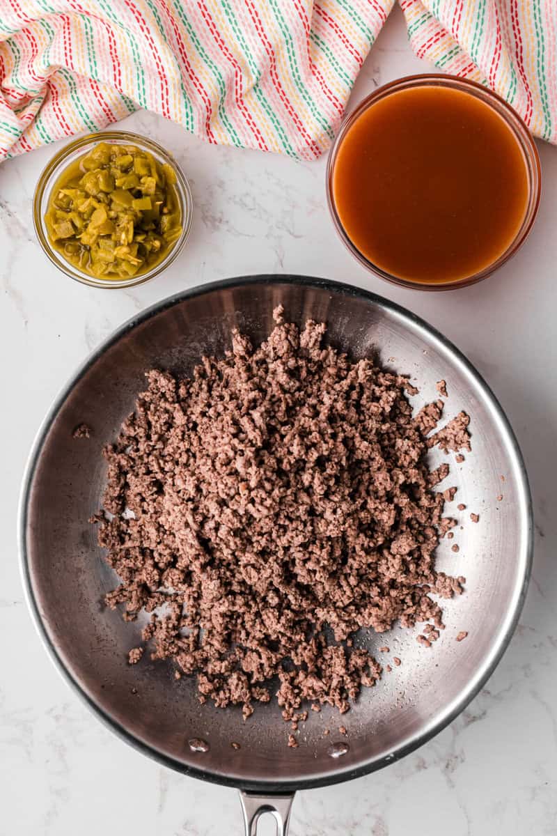 cooked ground beef in a skillet.