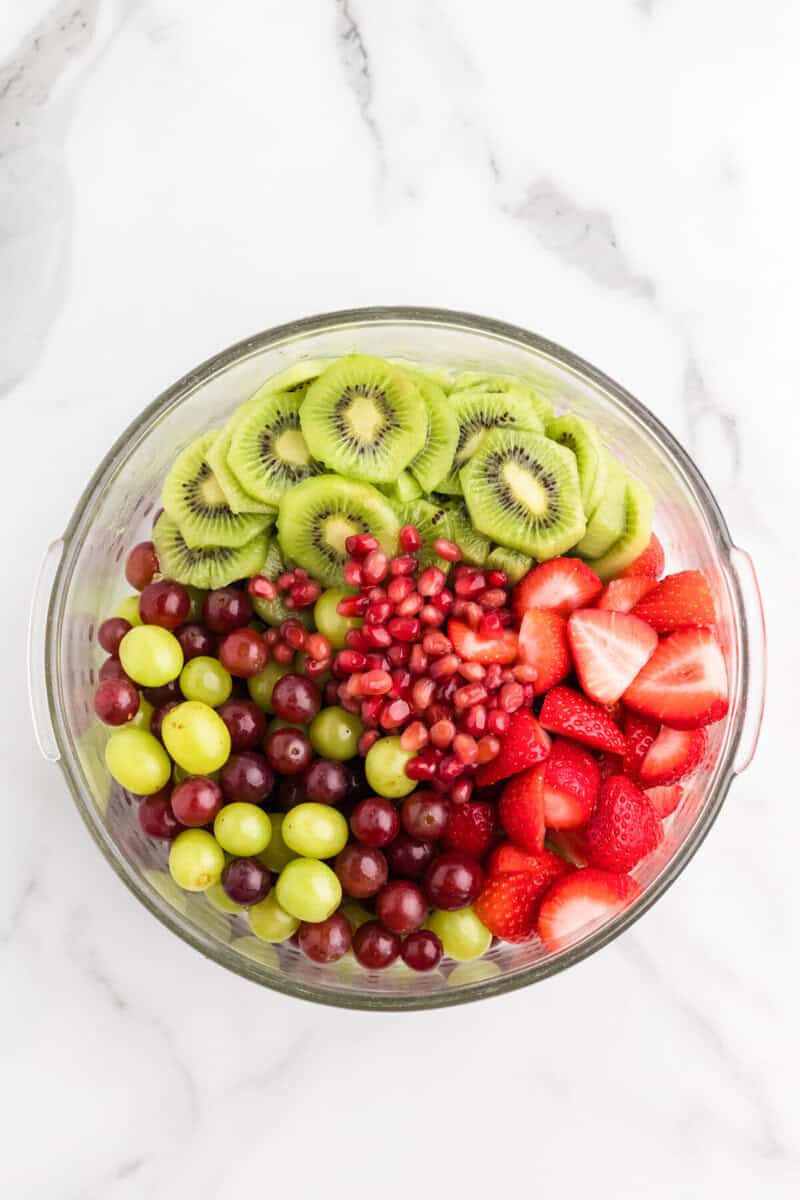 all the fruit in a large glass bowl.